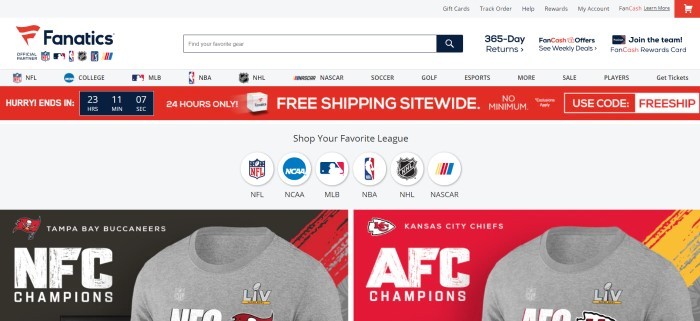 This screenshot of the home page for Fanatics has a white background and header with black text, a red announcement bar, a row of icons that shoppers can use to navigate to various league products, and two side-by-side photo advertisements of gray tee shirts with differing college logos at the bottom of the page.