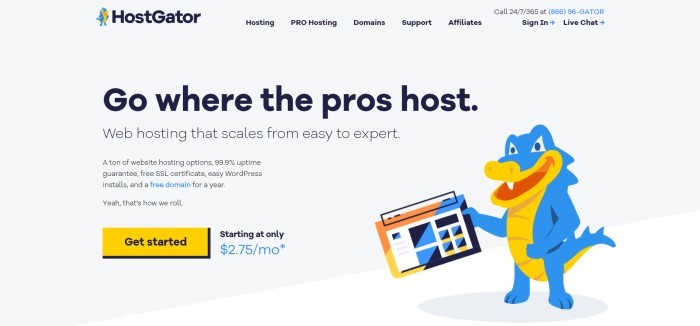 This screenshot of the home page for HostGator has a light gray background with black and blue text throughout the page, along with a yellow call to action button at the left side of the page and a graphic visual of a blue and yellow alligator holding a tablet on the right side of the page.