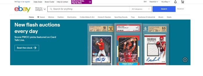 This screenshot of the home page for eBay has a white main background, search bar, and navigation bar above a teal section with white text and three photos of baseball cards.