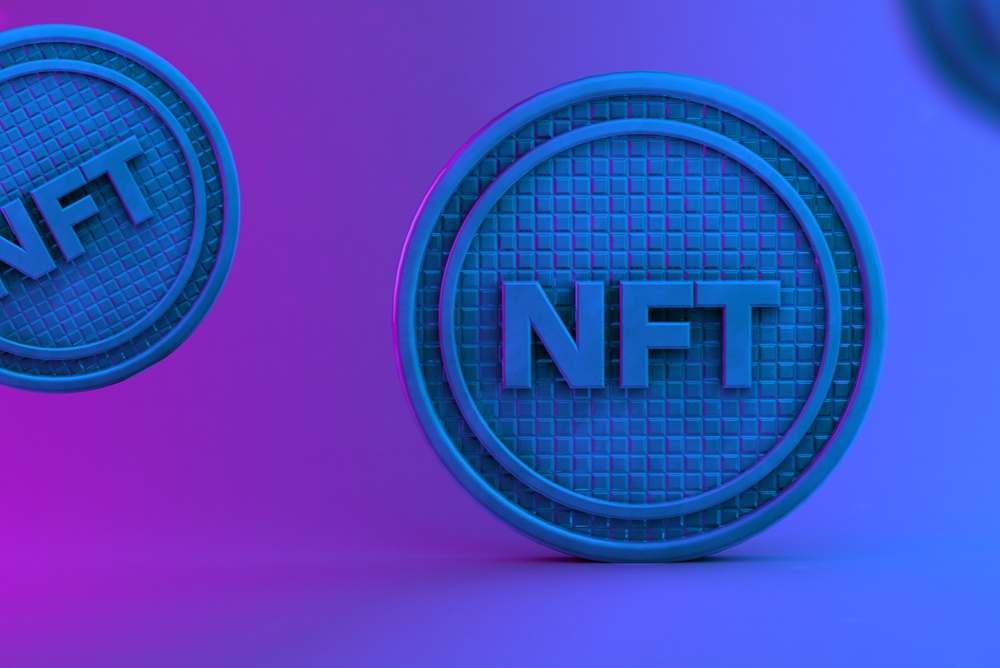 round token or "chip" in the color blue, with the letters NFT written on it. Visual representation of "blue chip" NFTs