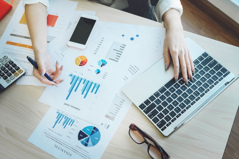 Person working on financial documents